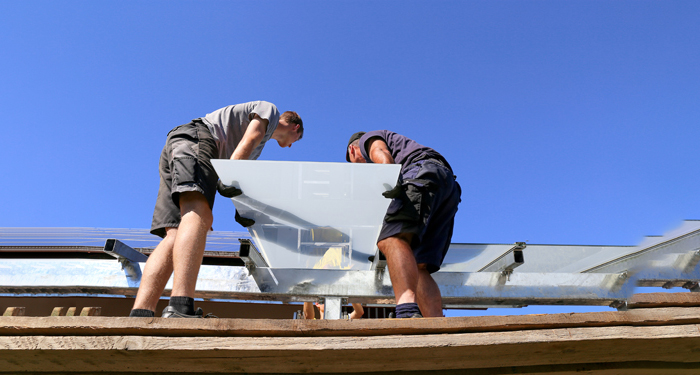 2 men on roof