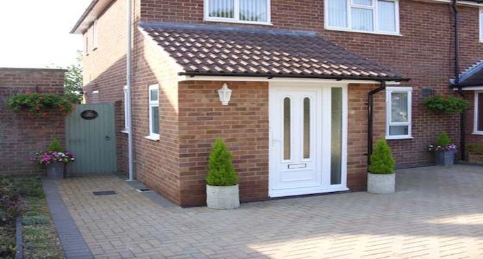 Brick porch white white door