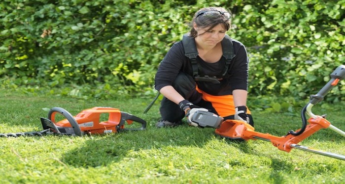 Orange petrol strimmer