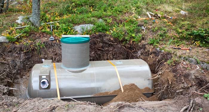Metal septic tank in the ground