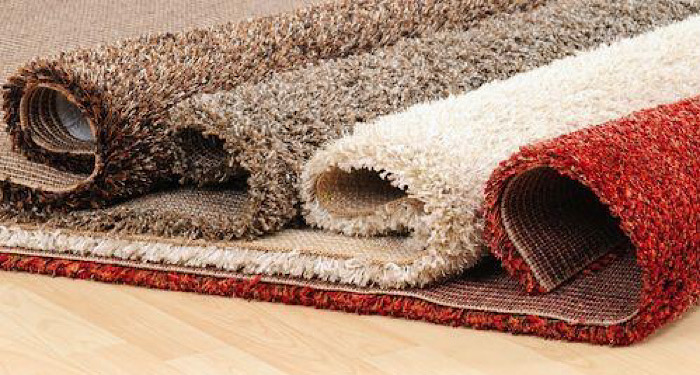 four rolls of carpet