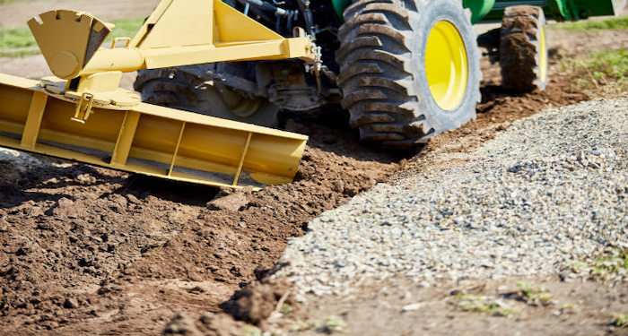 excavating soil for a driveway