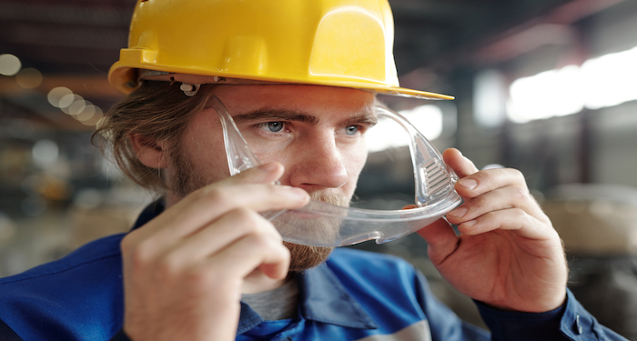 workman wearing goggles