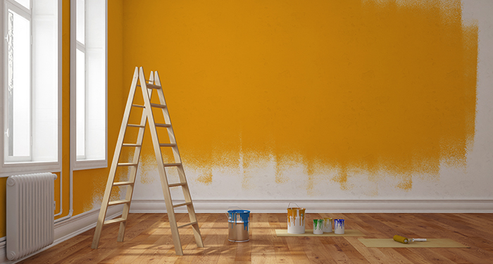 yellow half painted room