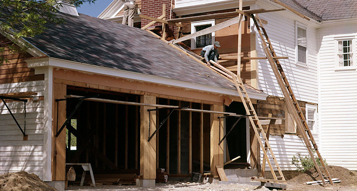 builder building a garage