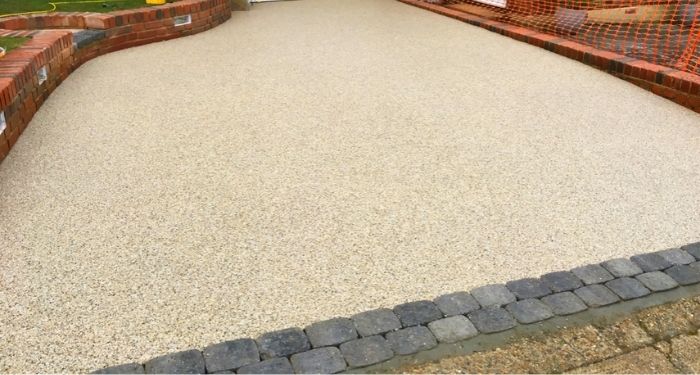 Beige resin bonded driveway