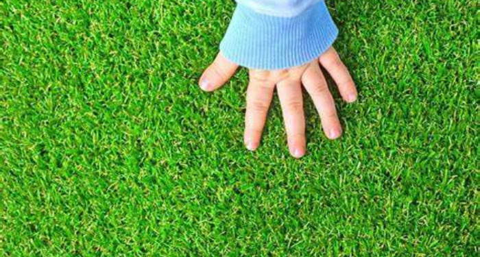 turf with a hand