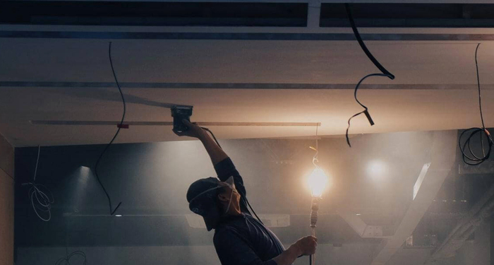 Workman Removing Ceiling