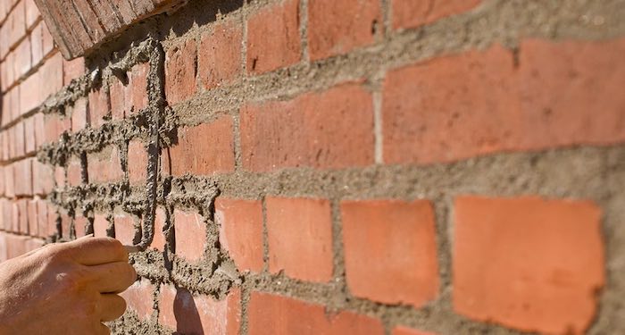 Flush pointing on brick wall