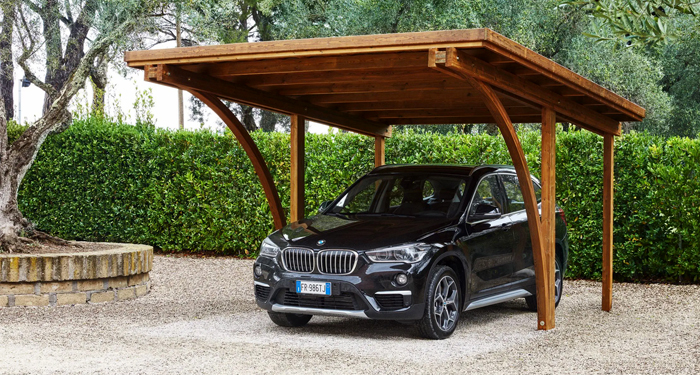 black car wooden carport