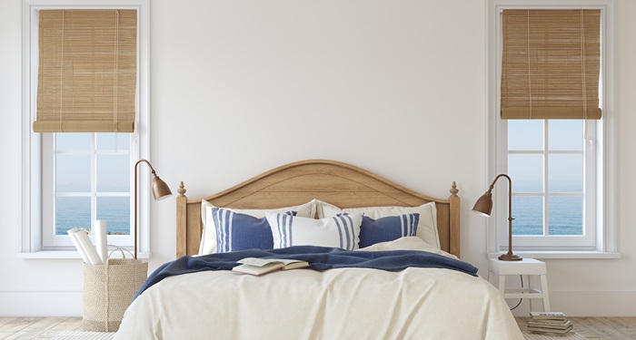 Striped pillows in beach bedroom