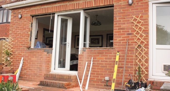 Patio doors being fitted