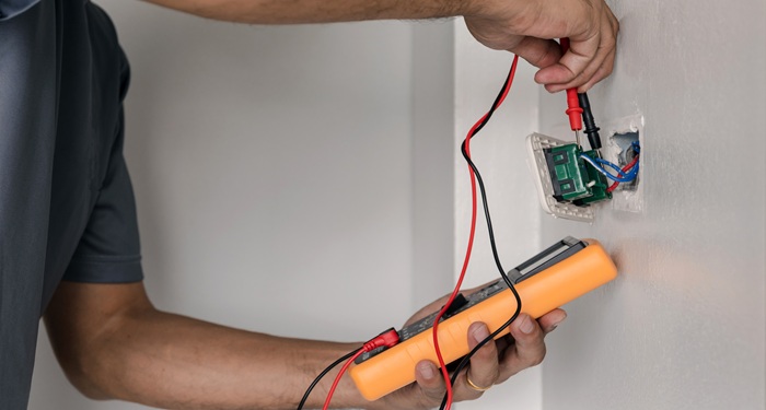 man with multi meter