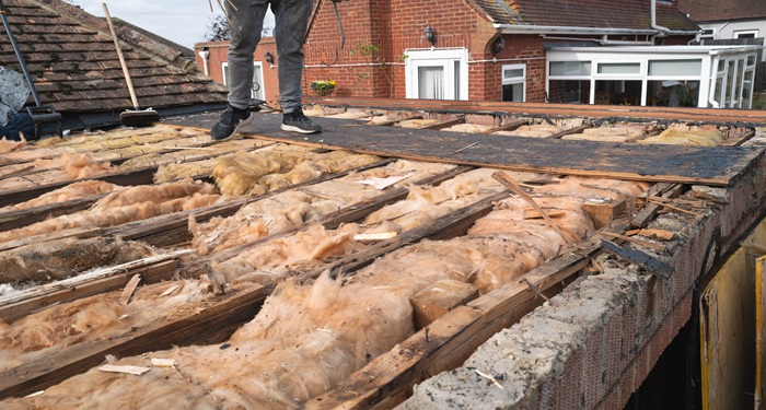 Man removing flat roof