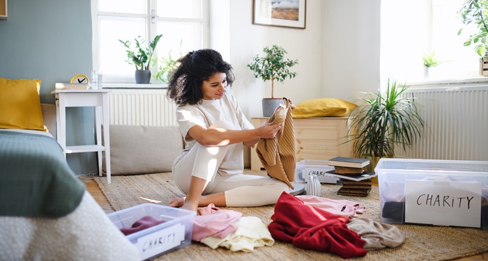 Woman organising wardrobe