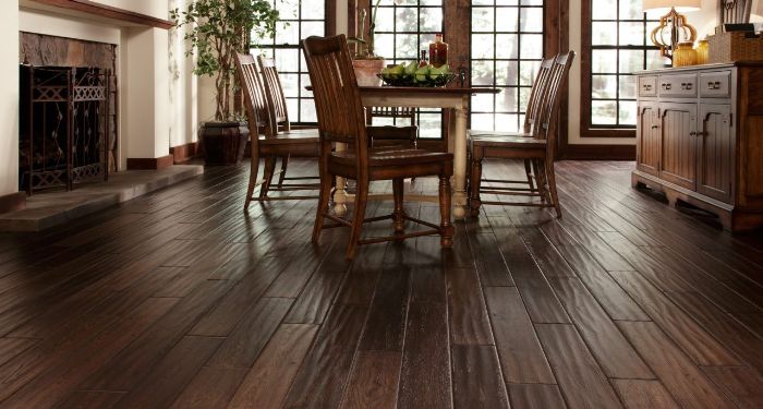 dining room table and chairs on hardwood flooring