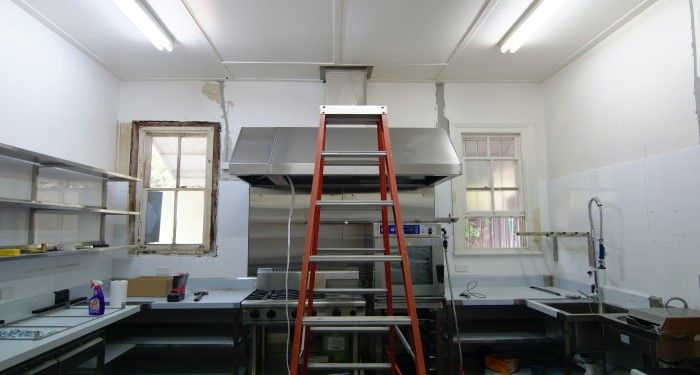 ladder in the middle of the kitchen