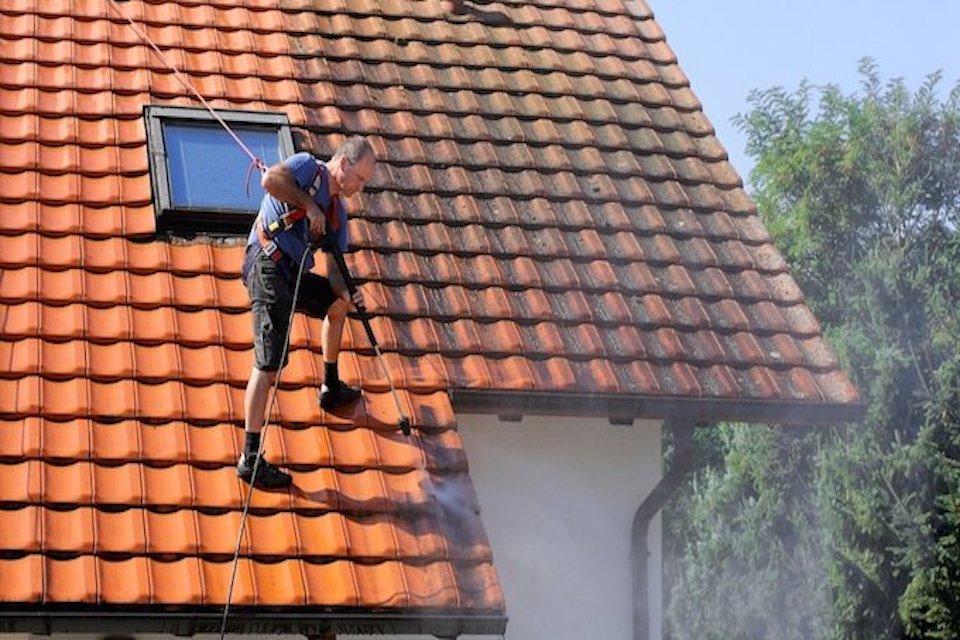 Roof cleaning and moss removal